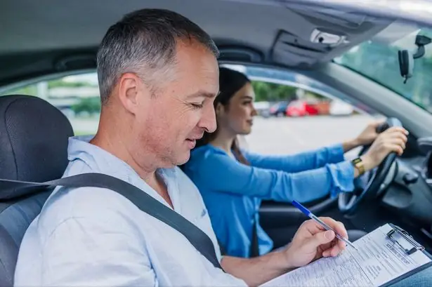 Driving instructor teaching a student driver in Toronto